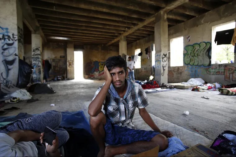 Earlier this month, a migrant man rested on the floor of a makeshift migrant camp in Bihac, northwest of Sarajevo, Bosnia. Impoverished Bosnia must race against time to secure proper shelters for at least 4,000 migrants and refugees expected to be stranded in its territory during coming winter.
