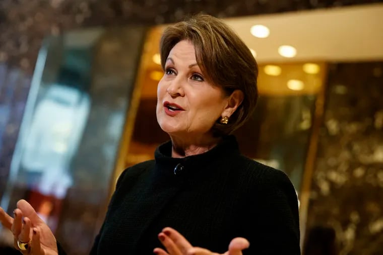 FILE - In this Jan. 13, 2017, file photo Lockheed Martin CEO Marillyn Hewson talks to reporters in the lobby of Trump Tower in New York.