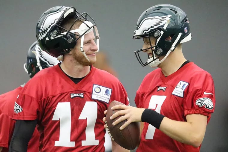 Eagles quarterbacks Carson Wentz (11) and Nate Sudfeld (7) are expected to be one-two on the depth chart.