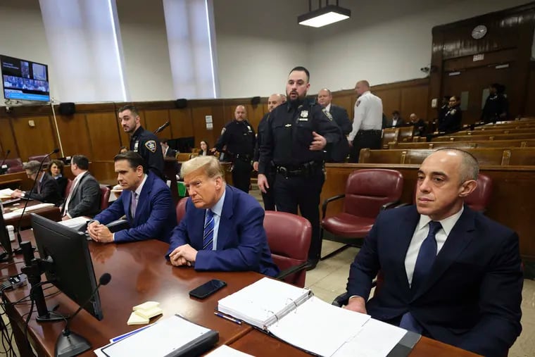 Former President Donald Trump appears at Manhattan criminal court in April in New York.