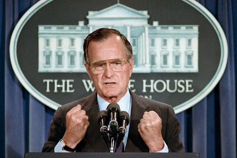 FILE - President George H.W. Bush in June 1989, the same month he addressed graduates at Cheltenham High School. President Bush holds a news conference at the White House in Washington where he condemned the Chinese crackdown on pro-democracy demonstrators in Beijing's Tiananmen Square.