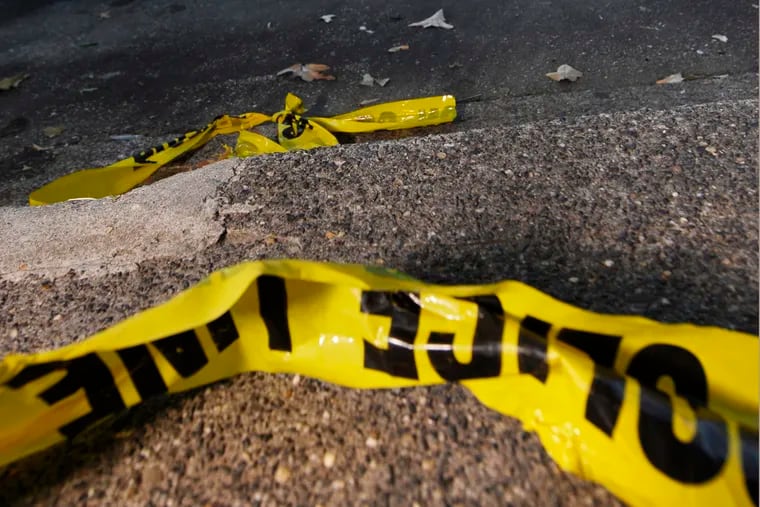 Three guns were found at the scene of Sunday's fatal shooting in the 200 block of South 57th Street in West Philadelphia.