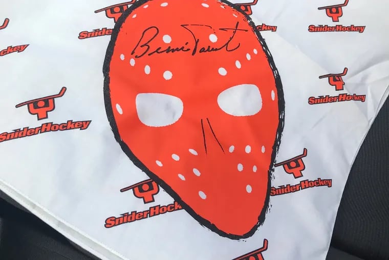 Flyers legend Bernie Parent and his wife, Gini, designed a bandanna/mask for people to wear during the coronavirus pandemic.