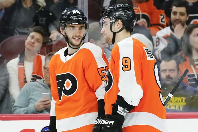 Flyers defensemen Shayne Gostisbehere (left) and Ivan Provorov had outstanding regular seasons but dipped in the playoffs. A separated left shoulder limited Provorov’s effectiveness in the Game 6 loss to the Penguins.
