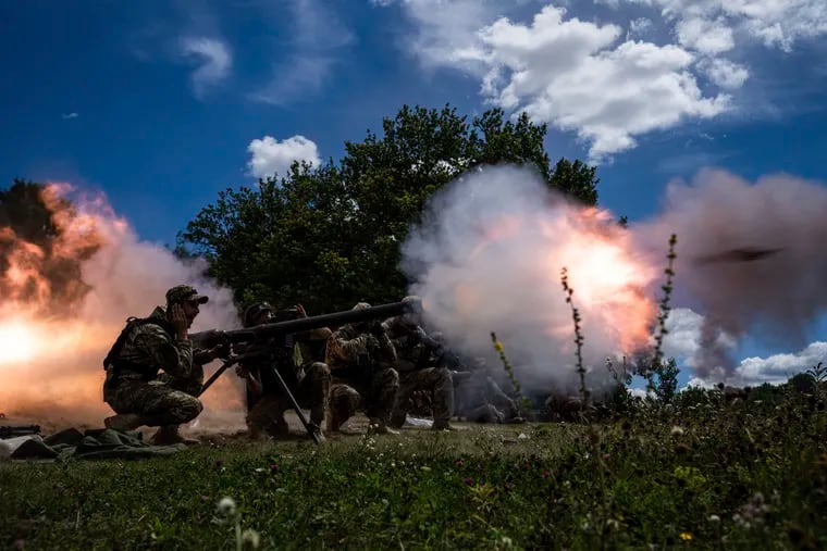 Ukrainian servicemen shooting with SPG-9 recoilless guns during training in Kharkiv region, Ukraine, on Tuesday.