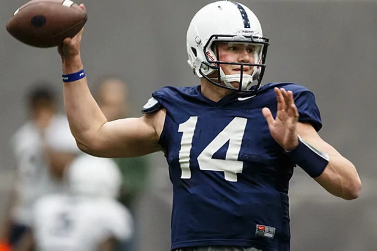 Penn State quarterback Christian Hackenberg throws during spring football practice at Holuba Hall, Wednesday,  April 1, 2015 in State College, Pa. (AP Photo/PennLive.com, Joe Hermitt)