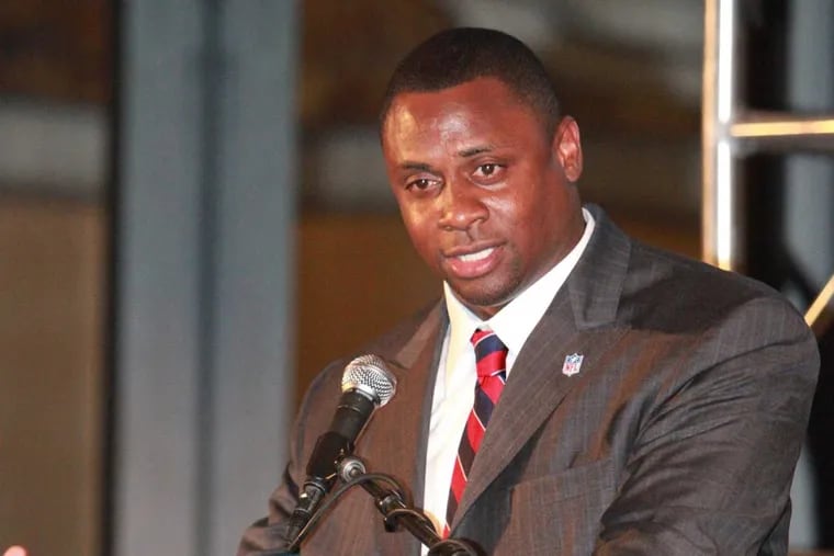 Troy Vincent, Vice President of the NFL Player Engagement Organization, accepts Leadership in Sport Award at the Sport for Social Change Awards ceremony in