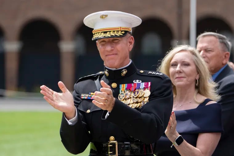 FILE - Acting Commandant of the U.S. Marine Corps Gen. Eric Smith applauds during a relinquishment of office ceremony for U.S. Marine Corps Gen. David Berger on July 10, 2023, at the Marine Barracks in Washington. Smith, the commandant of the Marine Corps, had open heart surgery on Monday, Jan. 8, 2024, and is now expected to return to full duty as the service's leader, the Corps said in a statement.(AP Photo/Manuel Balce Ceneta, File)