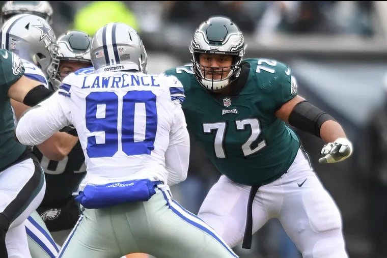 Eagles right tackle Halapoulivaai Vaitai preparing to block the Cowboys' DeMarcus Lawrence during the teams' game in December.