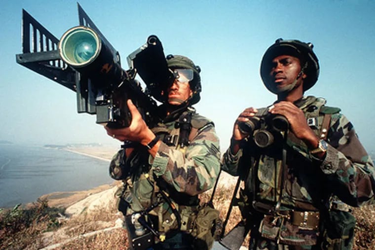 An FBI terrorism task force arrested men who were allegedly attempting to export Stinger missiles, like this one being operated by two soldiers in South Korea in this file photo.