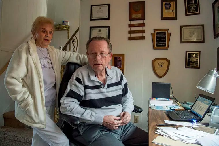 Former Inquirer sports columnist Bill Lyon and wife Ethel - his &quot;warrior woman,&quot; who has battled cancer and emphysema - at their Broomall home. He was found to have Alzheimer's disease three years ago.