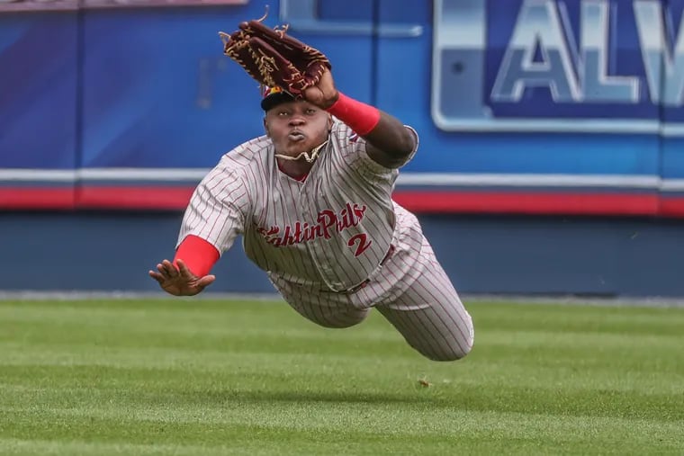 Reading Fightin Phils’ left fielder Cornelius Randolph making a diving grab of a line drive during a game on May 8, 2019.