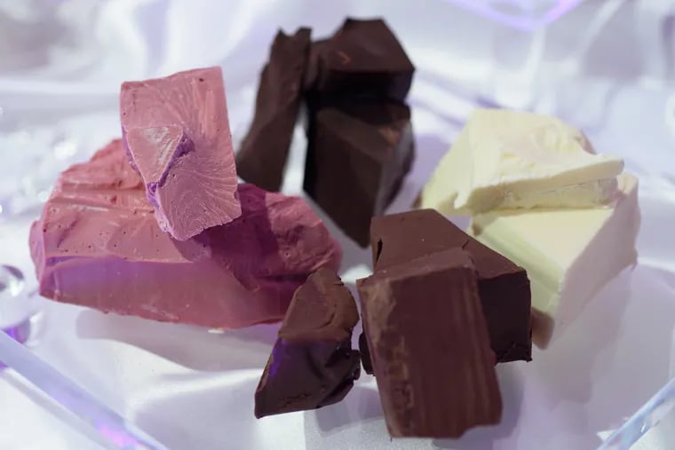 Blocks of chocolate, including ruby flavor, left, are displayed during Nestle's media event in Tokyo in January.