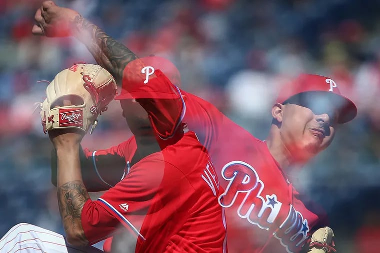 The Phillies' Vince Velasquez is seen in a double-exposure image as he pitches during the sixth inning against the Padres on Thursday, April 14, 2016.