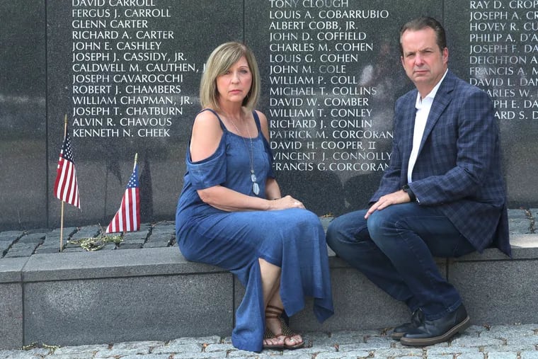 In June 1969, 74 sailors died when the USS Frank E. Evans sank in the South China Sea during the Vietnam War. Among them was Patrick Corcoran, a 19-year-old Philadelphia native. Pictured here are his brother, Tom Corcoran Jr., left; and sister, Suzanne Meissler, photographed in July 2018.