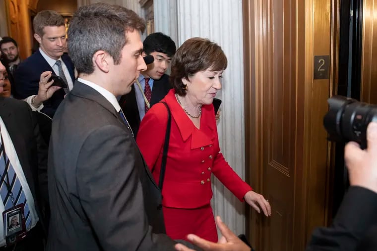 Sen. Susan Collins, R-Maine, heads to a waiting elevator on Capitol Hill, Tuesday, Feb. 4, 2020, in Washington.