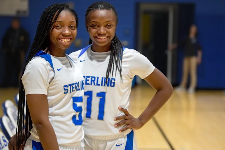 Sterling sisters (from left) Imani and Nia Holloway helped create a family atmosphere on the team.