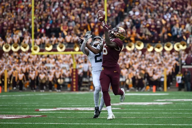 Minnesota wide receiver Tyler Johnson (6) caught a one-handed touchdown pass in the second quarter despite the efforts of Penn State Nittany Lions cornerback Keaton Ellis (2).