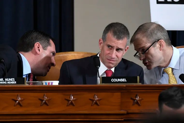 Ranking member Rep. Devin Nunes (R., Calif.) talks to Rep. Jim Jordan (R., Ohio), right, as Steve Castor, Republican staff attorney for the House Oversight Committee, center, listens at a House Intelligence Committee hearing.