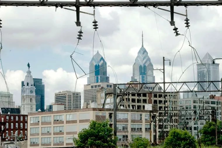 Philadelphia's skyline seen from the Reading Viaduct, private property that includes the abandoned Ninth Street Branch of the Reading Railroad.