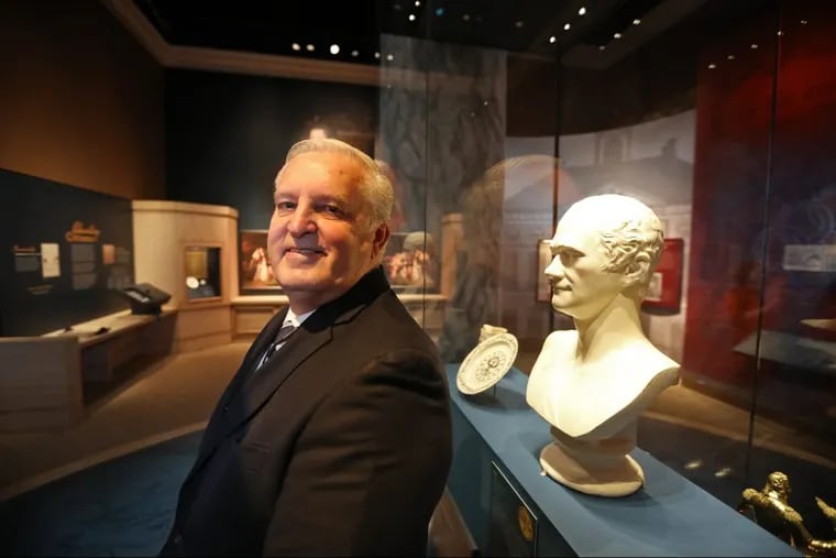 Alexander Hamilton's fifth great grandson, Doug Hamilton, net to a bust of his namesake at the Museum of the American Revolution, Monday November 12, 2018.