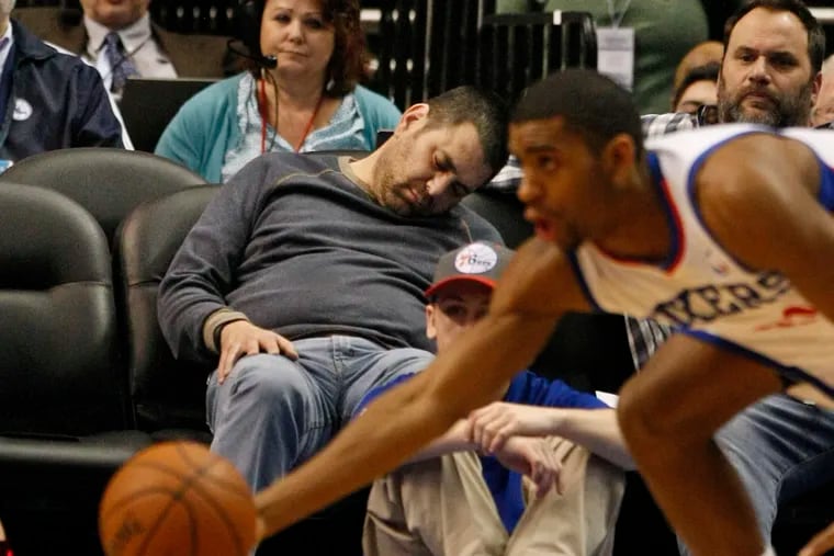 One fan slept through most of the second half of the Sixers-Bucks game in February 2014 at the Wells Fargo Center during the lean Sixers years.