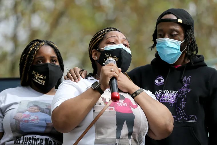 Siblings of Walter Wallace Jr. on stage in Philadelphia on April 25, 2021, at an event to mark the six-month anniversary of the police shooting of Wallace.