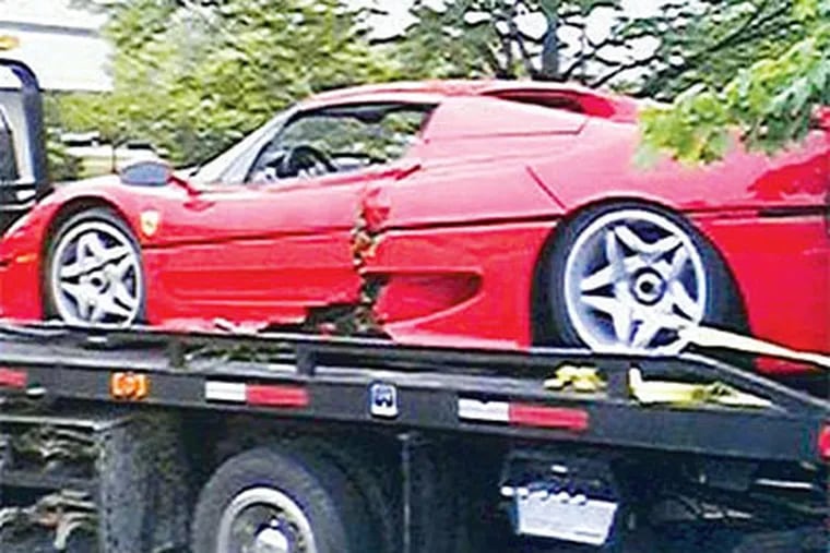 The $729,000 Ferrari that con man/pilot Tom Baker stole from a Main Line car dealership in '03. (WreckedExotics.com)