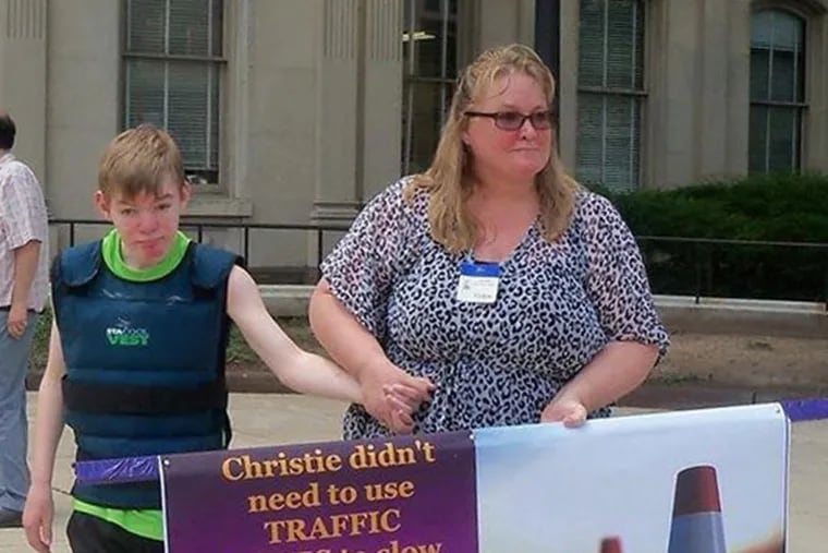 Jennie Stormes organized weekly protests against medical marijuana rules she says are too restrictive and hurt the ability of her son, Jackson, 15, to use the drug to control his seizures. (Photo courtesy of Jim Miller)