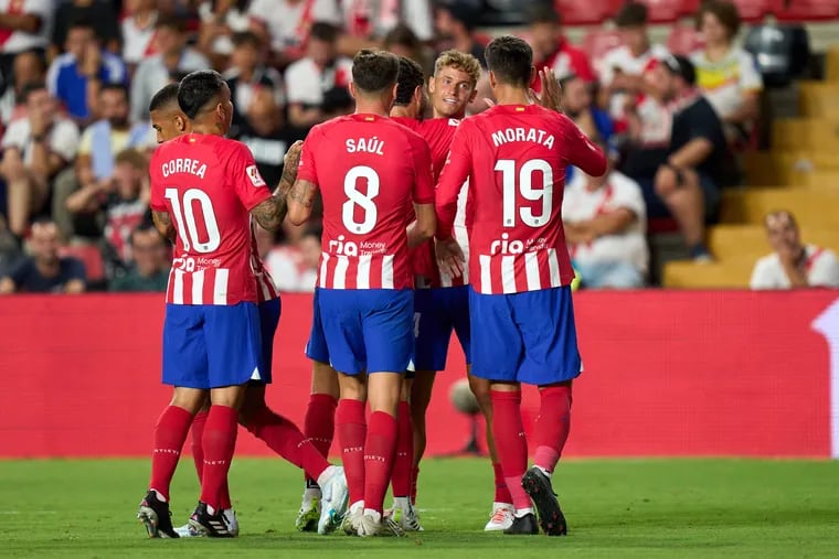 MADRID, SPAIN - AUGUST 28: Marcos Llorente of Atletico de Madrid celebrates with teammates after scoring the team's seventh goal during the LaLiga EA Sports match between Rayo Vallecano and Atletico Madrid at Estadio de Vallecas on August 28, 2023 in Madrid, Spain. (Photo by Angel Martinez/Getty Images)