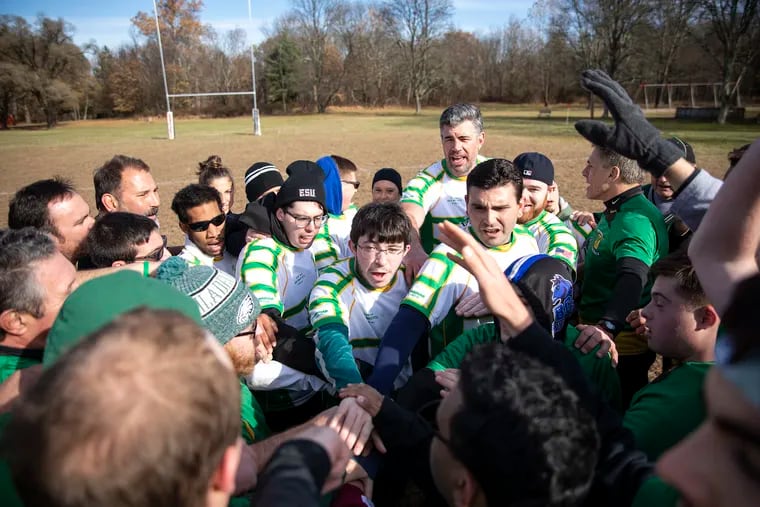 Both teams and coaches come together in a circle celebrating the final game of the Blackthorn Inclusive Rugby Team on Saturday Nov. 23, 2019.