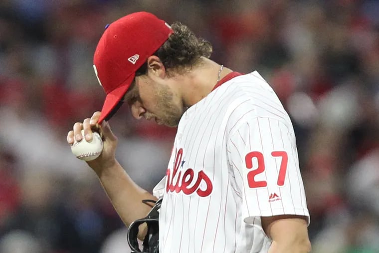 Aaron Nola of the Phillies after giving up a home run to Howie Kendrick of the Nationals in the 7th inning at Citizens Bank Park on April 9, 2019.
