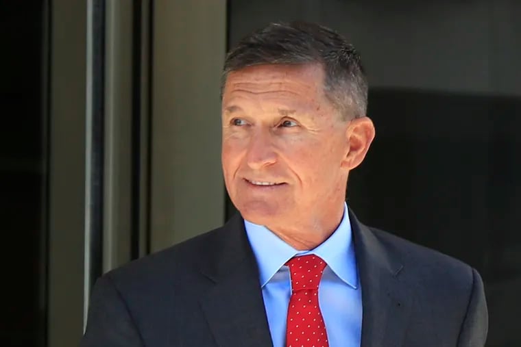 Former Trump national security adviser Michael Flynn leaves the federal courthouse in Washington, following a 2018 hearing.