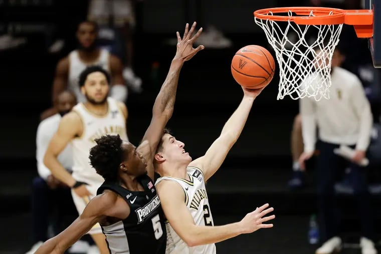 Villanova guard Collin Gillespie drives to the basket against Providence forward Jimmy Nichols Jr., in the second half.