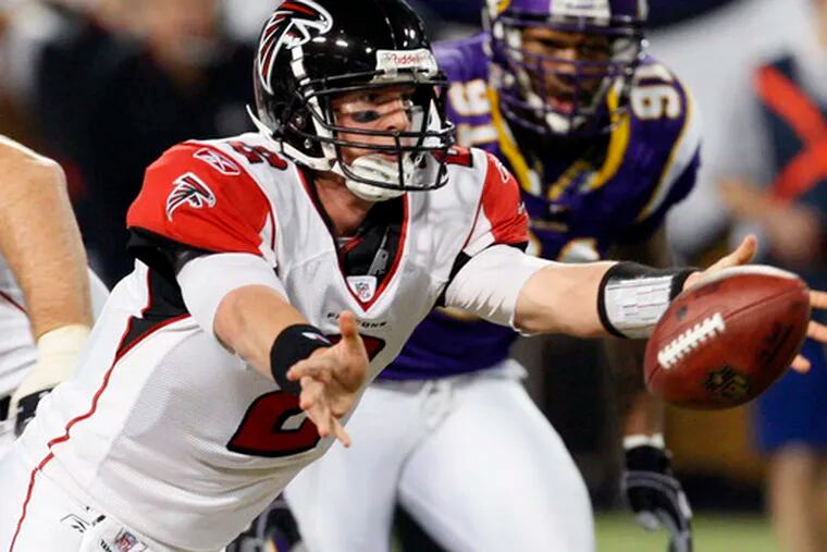 Atlanta quarterback Matt Ryan pitches the ball in the second quarter. Ryan threw for one touchdown in the game.