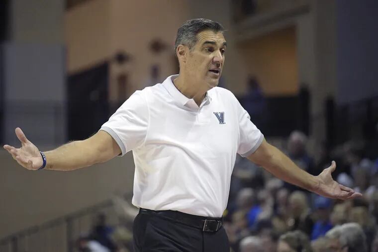 Villanova coach Jay Wright, shown here during Thursday's win, mingled with fans after the Friday victory.