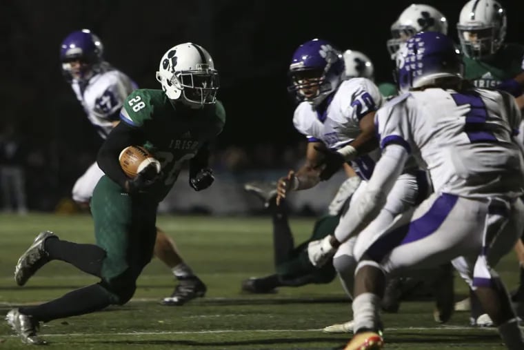 Camden Catholic’s Marcus Hillman running for a touchdown in his junior season against Cherry Hill West.