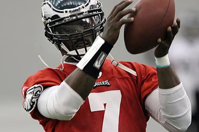 Michael Vick has spent the last month mostly under center. (Laurence Kesterson/Staff Photographer)
