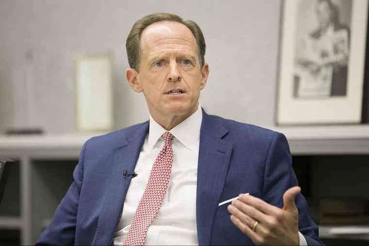 Sen. Pat Toomey (R., Pa.) speaks to editorial boards of the Philadelphia Inquirer and Daily News in 2016. He plans to reintroduce a bill to expand background checks for gun purchases.