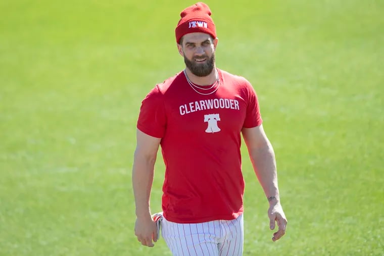 Phillies Bryce Harper looks on during spring training practice in Clearwater, Florida. Tuesday, February 23, 2021.