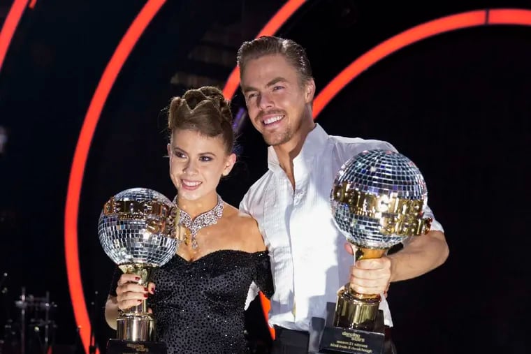 Bindi Irwin and Derek Hough hold the mirrorball trophies after winning the &quot;Dancing With the Stars&quot; competition.