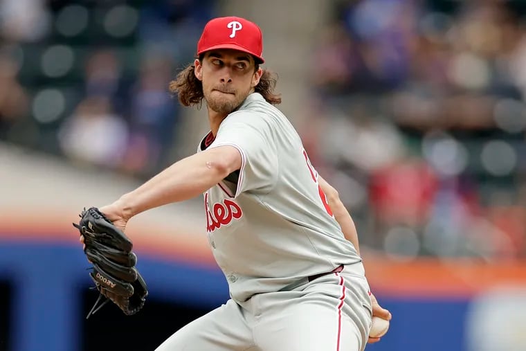 Aaron Nola allowed four hits and struck out eight in shutting out the Mets on Tuesday.