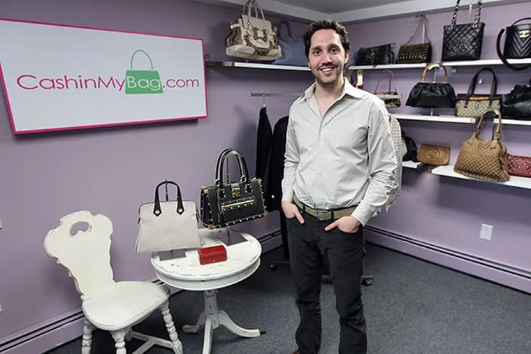Michael Zakroff, owner of CashinMyBag.com, poses in his shop in Narberth, Pa. on January 9, 2014. ( DAVID MAIALETTI / Staff Photographer )