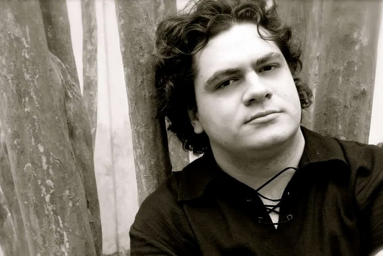 Cristian Macelaru, associate conductor of the Philadelphia Orchestra, filled in at Friday's concert when a guest conductor was forced to cancel.