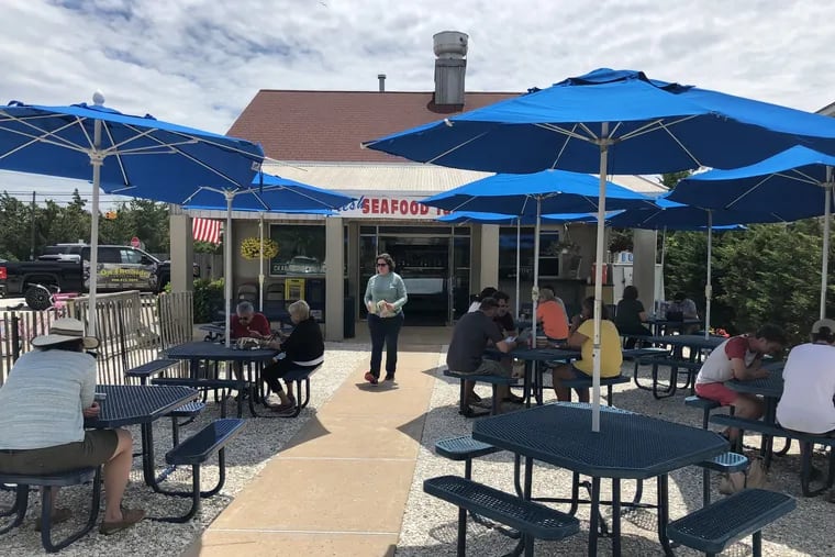 The picnic table patio at Viking Fresh Off the Hook, just beyond the fishing docks in Barnegat Light, is a destination for some the freshest scallops and seafood around.