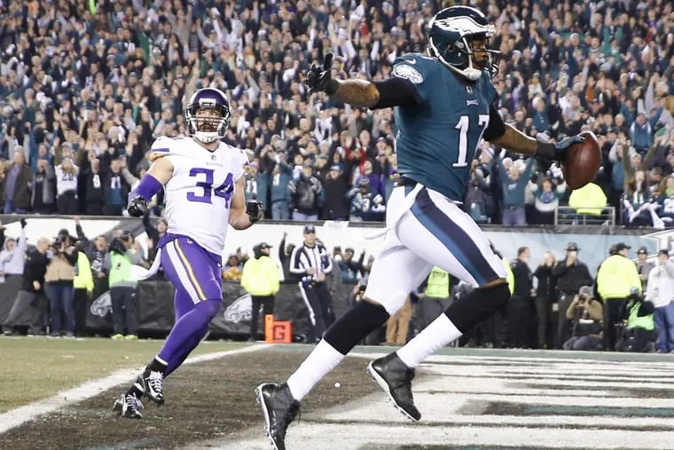 Philadelphia Eagles wide receiver Alshon Jeffery scores a second quarter touchdown past Minnesota Vikings strong safety Andrew Sendejo during the NFC Championship game on Sunday, Jan. 21, 2018 at Lincoln Financial Field in Philadelphia, Pa