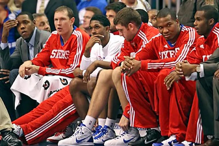 The Sixers' bench watches the closing seconds of last night's 94-86 loss to Raptors. (Steven M. Falk / Staff Photographer)