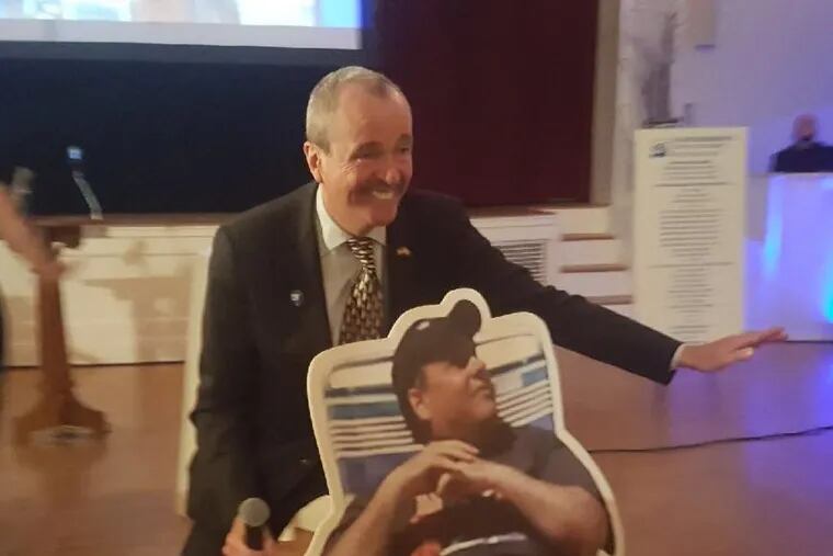 New Jersey Working Families Alliance captured this photo of Phil Murphy posing with the beach gate meme. Christie was not happy.