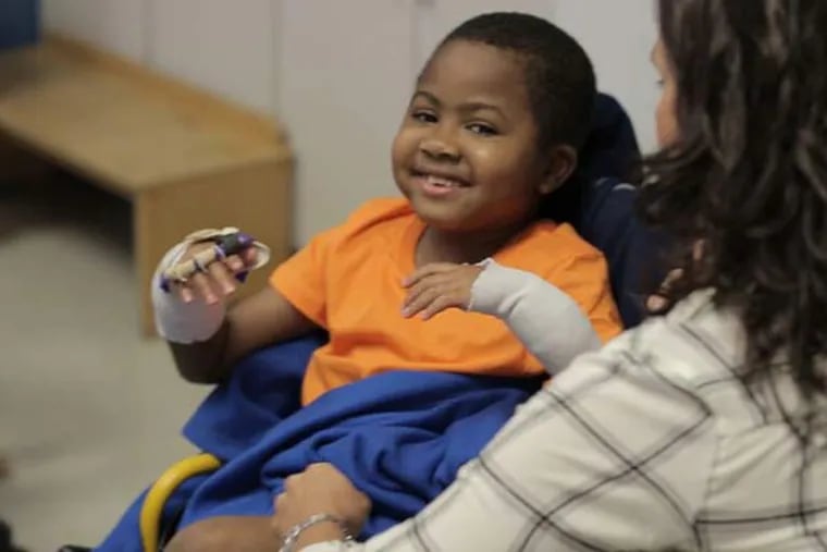 Zion Harvey, 8, the world’s first child to receive a double hand transplant.
