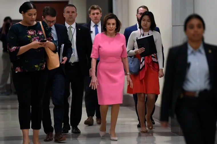 House Speaker Nancy Pelosi of Calif., heads to a news conference on Capitol Hill.